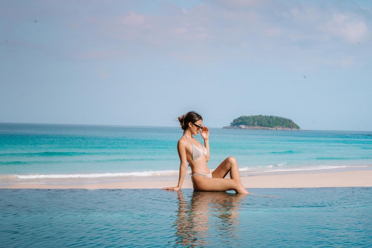 The Shore At Katathani - Adult Only - Sha Extra Plus Екстериор снимка A woman sunbathing on a beach